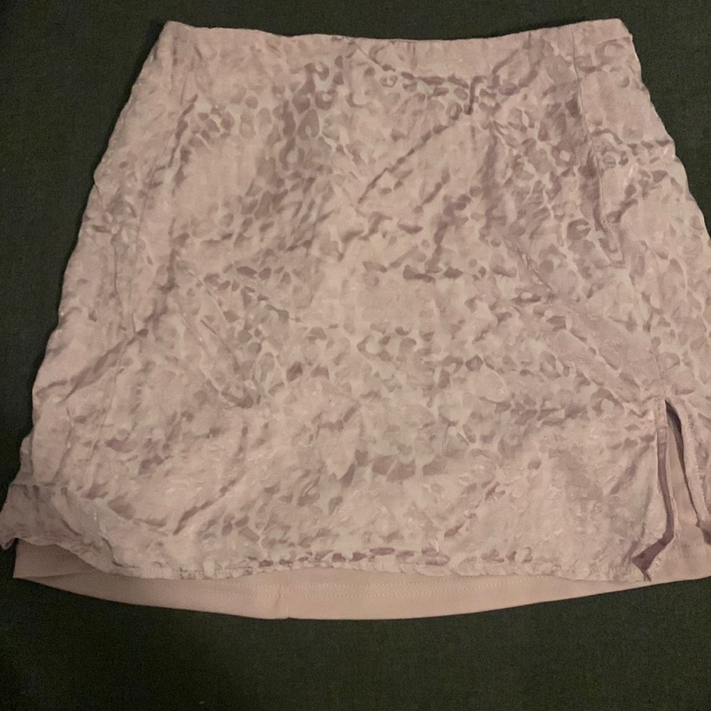 Pink cheetah print mini skirt.